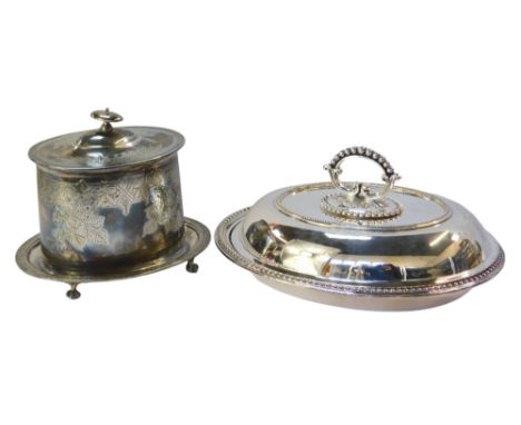 A late 19thC silver plated biscuit barrel, with moulded thumb piece and engine engraved floral decoration, and a silver plate