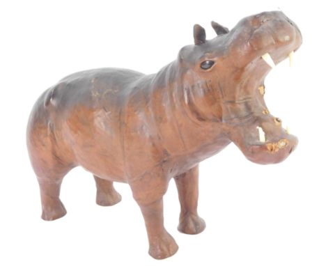 A leather covered model of a hippopotamus, with mouth open, 24cm high. 