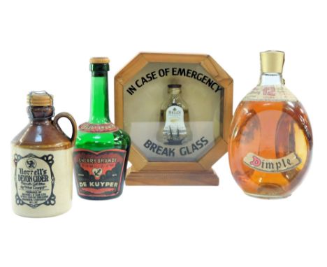 A bottle of Dimple whisky, 12 Years, 40%, 75cl, together with a miniature bottle of Bell's Scotch whisky, in case, bottle of 