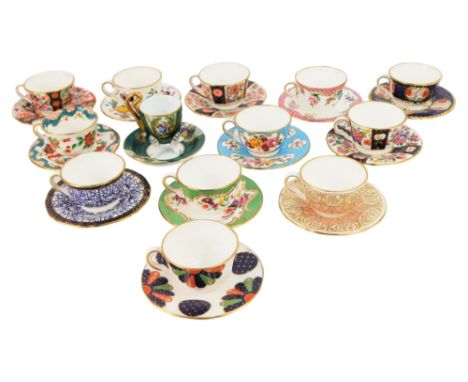 A group of Royal Worcester miniature porcelain cups and saucers, to include Pink Scale, The Wheat Sheaf, Jabberwocky, Royal L