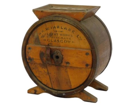 An SA McFarlane Ltd butter churn, for Spring Bank Glasgow, 43cm high. 