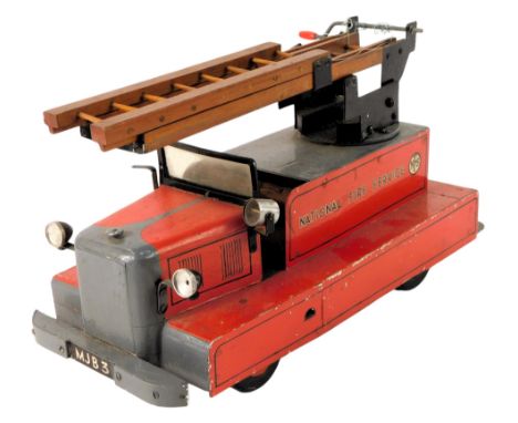 An NFS (National Fire Service) tinplate and wooden model of a fire engine, 39cm long. 