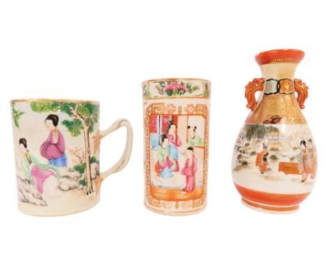 A group of Oriental porcelain, comprising a mug, decorated with female figures, one playing a musical instrument, with a twis