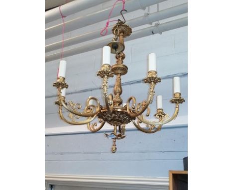 A gilt metal 8-light chandelier with reeded arms decorated with ribbon tied swags, drop approximately 65cm