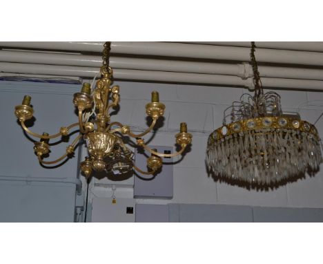 A silvered metal seven branch chandelier ornamented with bacchanalian figures (drop approx 42cm, 65cm wide), together with an