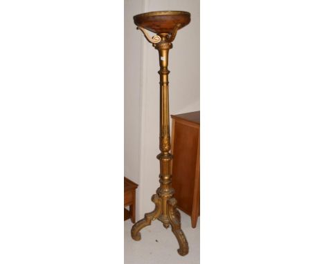~ A reproduction fluted giltwood standard lamp with marble glass shade, 182cm