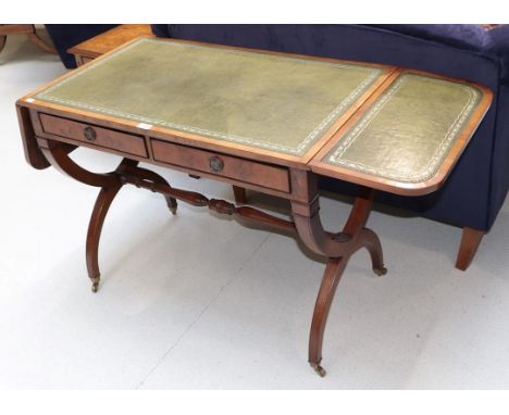 A reproduction leather inset sofa table fitted with two drawers, 93cm closed by 55cm by 72cm