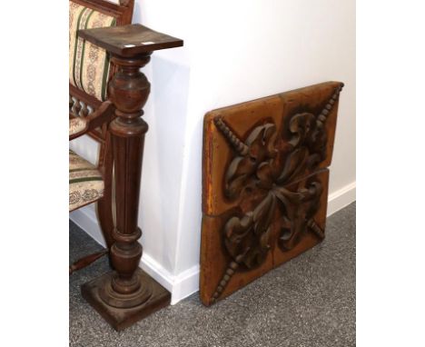 ~ A continental hardwood pedestal, 106cm high, together with a decorative carved relief wood panel, 87cm square (2)