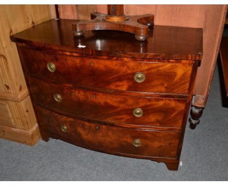 A 19th century mahogany bow front three-height chest of drawers 107cm by 54cm by 82cm high