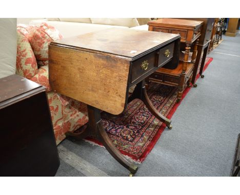 A mahogany small two drawer sofa table.