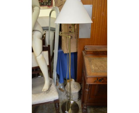 An adjustable floor standing lamp.