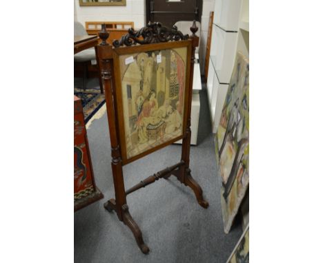 A 19th century rosewood firescreen.
