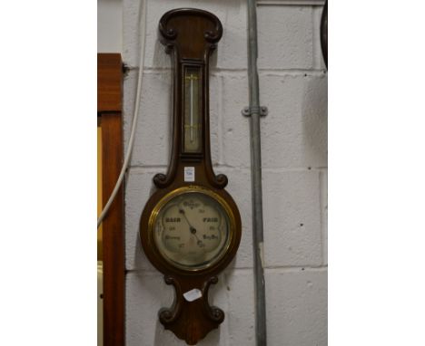 A barometer/thermometer.