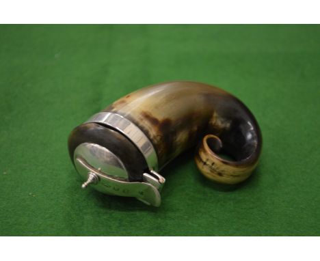 A silver mounted horn snuff box.