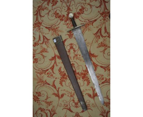 An early 19th century sword and scabbard, possibly made for theatrical use.