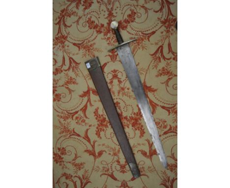 An early 19th century sword and scabbard, possibly made for theatrical use.