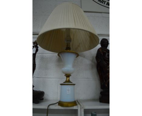 An ormolu and opalescent glass urn shaped lamp.