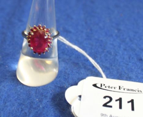 9ct gold and ruby (treated) cluster ring, 5g approx.(B.P. 24% incl. VAT)