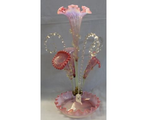 Victorian pink vaseline glass table centre epergne, having centre flute, three scroll canes, three further curved flutes on a