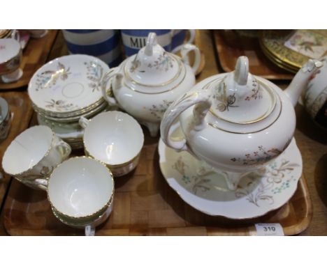 Late Victorian gilt and foliate part tea set comprising: cups and saucers; lidded sucrier; teapot and sandwich plate.(B.P. 24