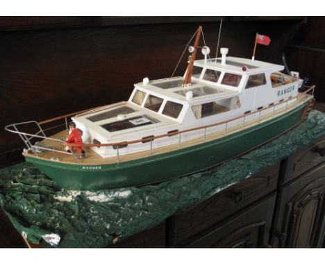 Well made scale model of the motor cruiser 'Ranger', on realistic base with figures.(B.P. 24% incl. VAT)