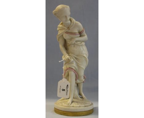 Worcester porcelain gilded blanc de chine figurine of a young woman on circular naturalistic base with gilded foot.  Impresse