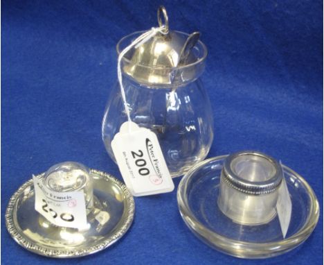 Silver collared candlestick, silver and glass inkwell and glass and silver lidded jar with silver spoon. (3)(B.P. 24% incl. V