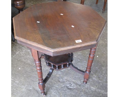 Edwardian walnut octagonal occasional table with galleried under shelf on ceramic casters.(B.P. 24% incl. VAT)