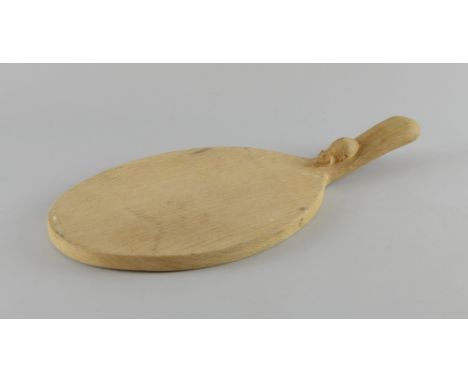 Robert 'Mouseman' Thompson oak oval cheese board, the handle with a carved mouse, 37cm long,     