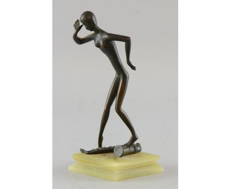 Austrian bronze Art Deco figure of dancing woman with saxophone, in the manner of Hagenauer, on green onyx base, apparently u