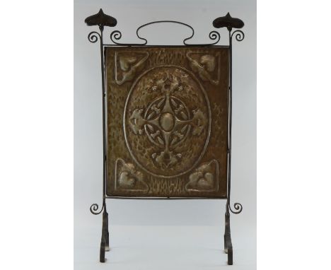 Arts & Crafts firescreen in wrought metal with stylised floral decoration, 77cm x 50cm,     