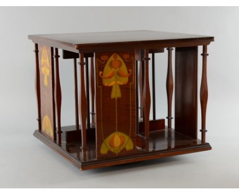 Art Nouveau mahogany and marquetry inlaid table top revolving bookcase, probably by Shapland & Petter with four panels of inl