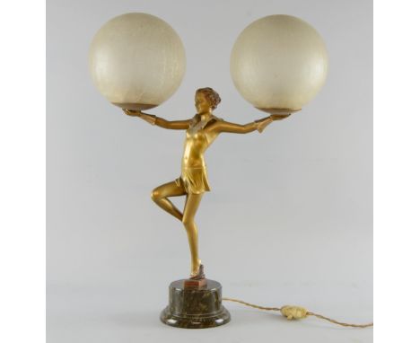 Art Deco metal figural lamp cast as a female dancer on one leg with arms outstretched on stepped marble base, 51cm high,     