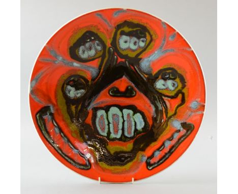 Poole Pottery charger with abstract design on a red ground, dolphin mark , 41 cm     Condition good no chips, cracks or resto