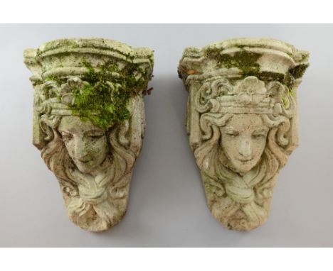 A pair of Art Nouveau, garden wall pockets in the form of girls heads with flowing locks, composition stone, 40cm,     