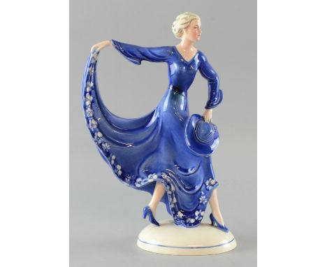 Katzhutte, German Art Deco figure of a dancing lady in blue dress holding a hat , 29 cm     small chip and firing crack to ha