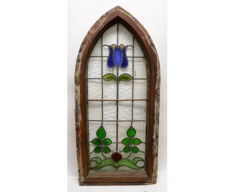 Early 20th century stained glass panel decorated with a stylised blue flower, 126cm x 56cm,     