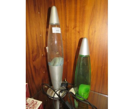 A LAVA LAMP WITH SPARE FITTING