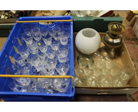 TWO TRAYS OF CUT GLASS DRINKING GLASSES ETC. TOGETHER WITH A VINTAGE OIL LAMP - PLASTIC TRAY NOT INCLUDED 