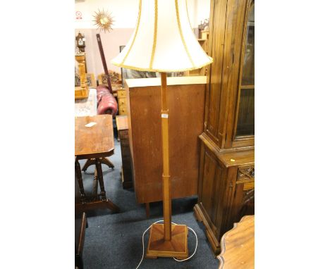 AN ART DECO STYLE STANDARD LAMP AND SHADE