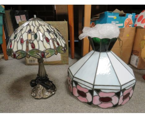 A TIFFANY STYLE LAMP TOGETHER WITH A LARGER TIFFANY STYLE LEADED GLASS SHADE
