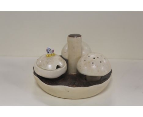 A CARLTONWARE MUSHROOM SHAPED CRUET SET