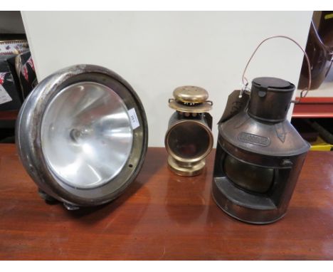 A LARGE GNOME CAR HEADLIGHT, TOGETHER WITH A REPRODUCTION STARBOARD LAMP AND ANOTHER (3) 