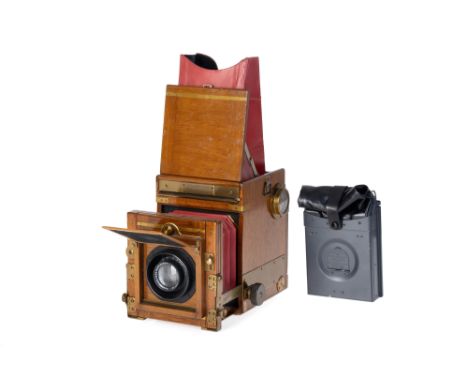A Soho Tropical Quarter Plate Reflex Camera, 1920, teak, serial number M3816, with Carl Zeiss Tessar f/6.3 210mm lens, black,