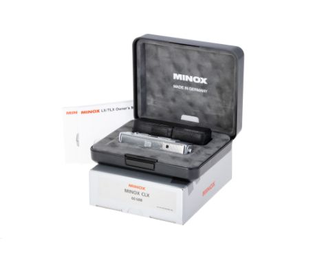 A Minox CLX Sub-Miniature Camera, 1998, chrome, serial no. 00001106, with Minox f/3.5 15mm lens, body, E, shutter sticking, l