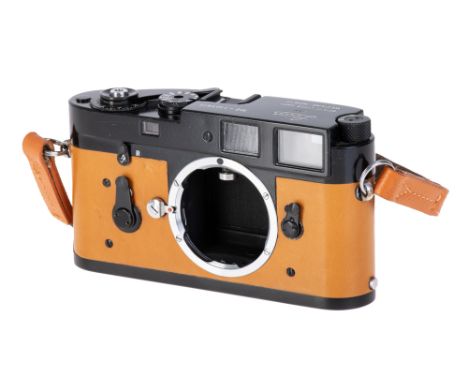 A Leica M2 'Black Paint' Rangefinder Camera, 1962, 'black paint', serial no. 1043810, body, G, shutter workingNote: This came