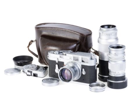 A Leica M3 Rangefinder Camera Outfit, 1955, chrome, serial no. 743296, with Leitz Summicron f/2 50mm lens, 1955, chrome, seri