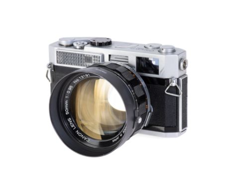 A Canon Model 7 Rangefinder Camera, 1961-64, chrome, serial no. 877358, with Canon f/0.95 50mm lens, black, serial no. 13191,