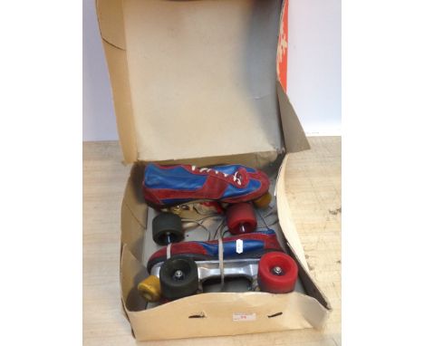 PAIR OF ROLLER SKATES