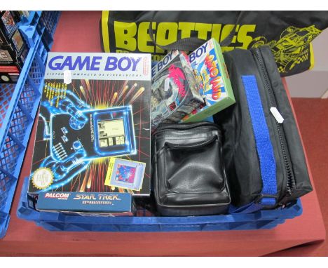 A Boxed Nintendo Gameboy Hand Held Gaming Console, (corrosion to battery compartment noted), gaming cartridges including Tetr